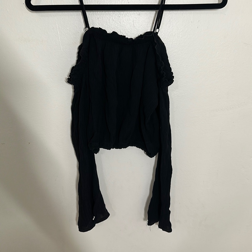 Off the shoulder or strap cropped black ruffle top